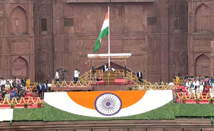Prime Minister Narendra Modi unfurls the tricolor from the ramparts of the Red Fort in Delhi and addresses the nation